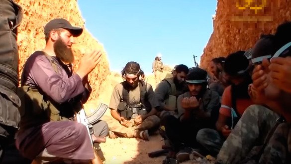 A YouTube screenshot shows Imam Bukhari Jamaat (IBJ) militants in Idlib Province, Syria. The video was uploaded April 12.