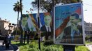 17-mart kuni olingan suratda Rossiya prezidenti Vladimir Putin va Suriya prezidenti Bashar Asadning Aleppo shahridagi portretlari tasvirlangan. (Jorj Urfalyan/AFP)