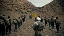 Сурияда олинган суратда Ислом инқилоби қўриқчилари корпуси (ИИҚК) томонидан қўллаб-қувватланган Афғонистоннинг Фотимиюн дивизияси жангчилари акс этган. Улар Сурияда Россия армияси кўмагида Сурия президенти Башар Асад ва Эроннинг мутаассиб манфаатларини ҳимоя қилиш йўлида жанг қилмоқдалар. (File)