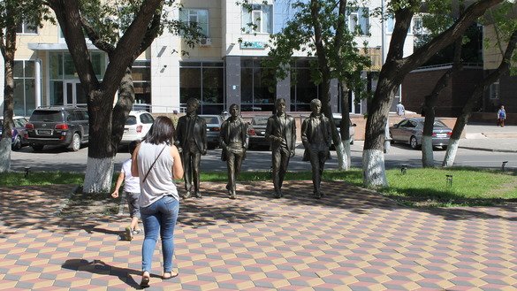 The murals are not the only art on the Astana streets. This picture taken August 14 shows a statue of the Beatles, situated near the Ishin River embankment. [Aydar Ashimov]