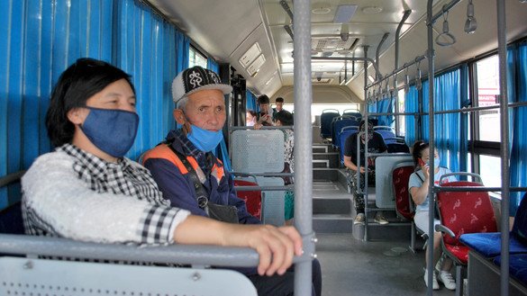 Passengers ride a Bishkek transit bus July 13. [Maksat Osmonaliyev]