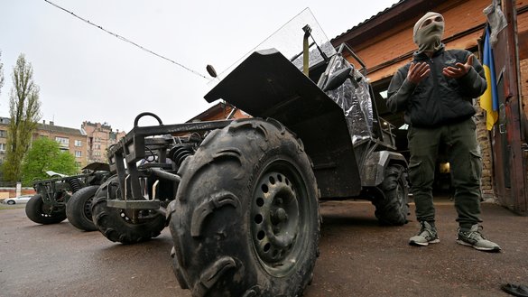 Musa, 29, talks as he stands next buggies outside Dracarys workshop at an industrial site in Kyiv on April 27. [Sergei Supinsky/AFP]