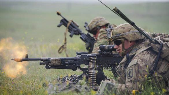 A US paratrooper fires blank ammunition during Exercise Noble Partner 16 at Vaziani Training Area in Georgia May 15, 2016. The exercise is a recurring training event that plays a critical part in Georgia's training for its contribution to NATO. [US Department of Defence]