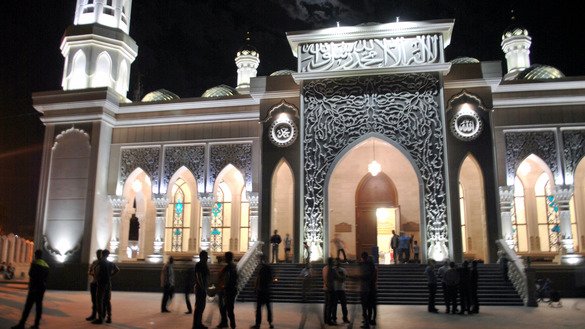 Muslims depart the mosque after tarawih prayer June 2. [Maksat Osmonaliyev]