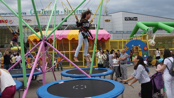 A girl jumps on a trampoline in Astana's central park. [Aydar Ashimov]
