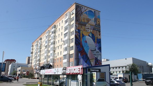 This mural, seen on a housing development in Astana on August 14, depicts the Hazrat-Sultan Mosque, one of the city's landmarks. The artist has filled the mosque with other subject matter symbolising the various stages of the city's development. [Aydar Ashimov]