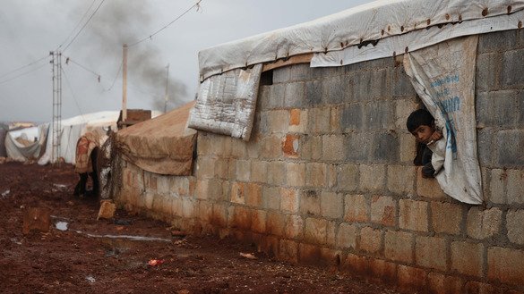 Suriyaning eng ko‘p isyonchilar joylashgan shimoliy viloyati Idlibning Atme qishlog‘i lageridagi bola, 6-dekabr. (Aaref Watad/AFP)