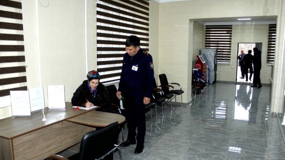 Police personnel at the new police service centre in Taraz, pictured November 30, 2018, help resolve citizens' problems and inquiries quickly. [Zhambyl Province police department]