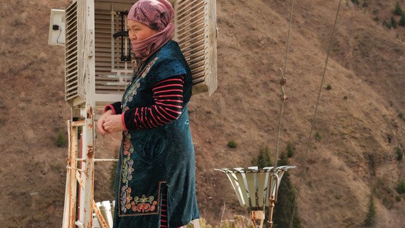 A weather station manager is shown in Kyrgyzstan. [Christina Stuhlberger/Zoï Environment Network]