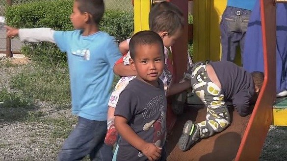 Children who returned from Syria to Kazakhstan play at a rehabilitation centre in Mangystau Province, Kazakhstan. The screenshot is from a KNB video.