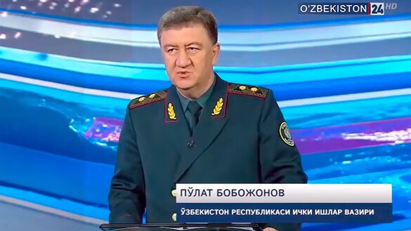 Interior Minister Pulat Bobojonov announces the closure of Jaslyk on August 5 in a screenshot from Uzbek TV.