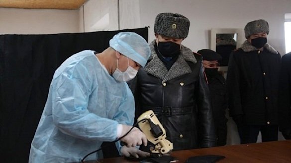 A prisoner makes protective masks in a correctional facility in Akmola Province on March 25. [Kazakh MVD]