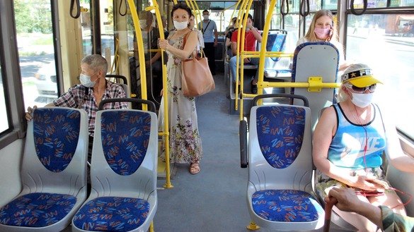 Passengers are shown on a bus in Bishkek on May 31. Public transport resumed on May 25 in Bishkek. Few passengers are riding, say drivers, who add that workers disinfect buses at the end of every route. [Maksat Osmonaliyev]