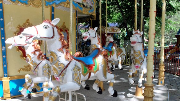 A children's carousel sits idle on June 1 (Children's Day) in Bishkek. [Maksat Osmonaliyev]