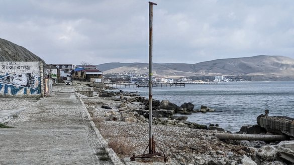 Once popular with visitors, who used to spend time at a local club, a beach on the Black Sea near Kiziltash village on the southern coast of Crimea stands empty and desolate, in a photograph taken February 24. [Yevgenij Gordienko/Caravanserai]