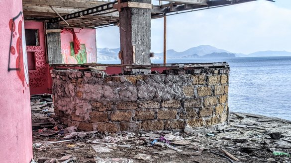 The Victor Cafe on the Koktebel embankment, seen here on February 26, has fallen into ruin since the cafe's owner fled the Russian invasion of Ukraine in 2014, leaving everything behind. [Yevgenij Gordienko/Caravanserai]