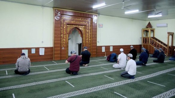 Worshippers await the start of prayer at the Kelechek mosque in Bishkek on April 27. [Maksat Osmonaliyev/Caravanserai]