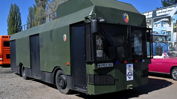 An armoured vehicle for medical use is parked at a workshop in Kyiv's outskirts on May 1. [Sergei Supinsky/AFP]